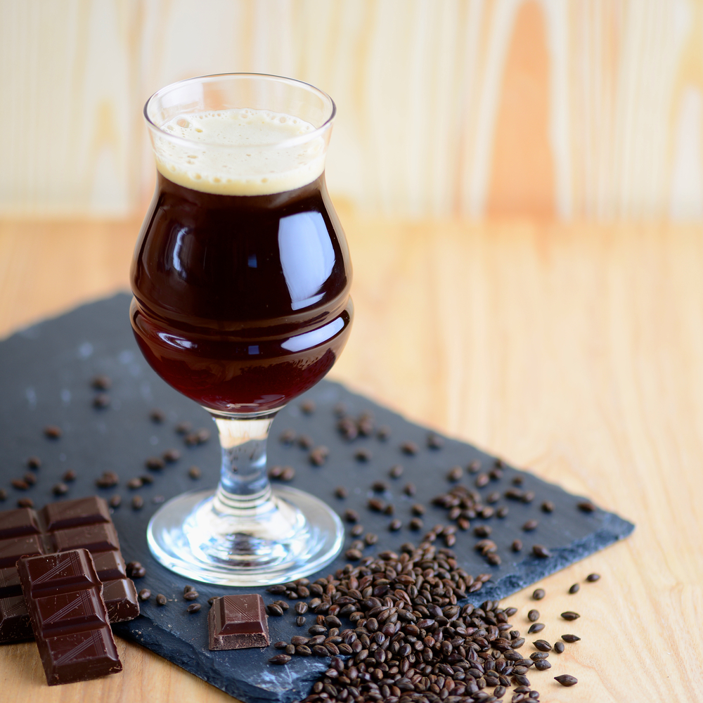 Wineglass,Of,Chocolate,Beer,Serving,On,Black,Rock,With,Chocolate